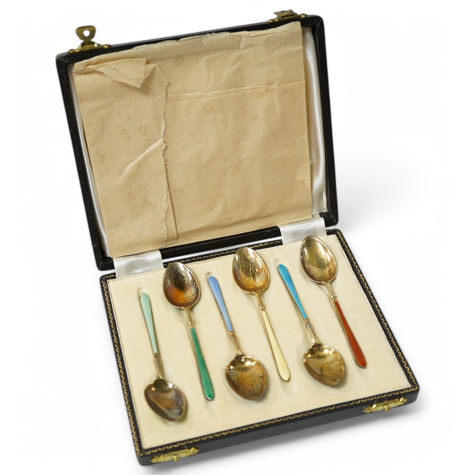 A cased set of six early 1950's silver gilt and polychrome enamel coffee spoons by Suckling Ltd (enamel a.f.). Condition - poor to fair